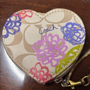 Coach Poppy Flower daisy appliqué heart-shaped coin purse with a wrist strap